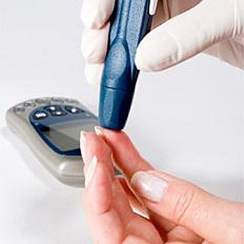 Finger being pricked for diabetes test