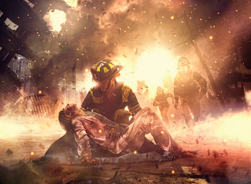 Fire fighter saving a boy