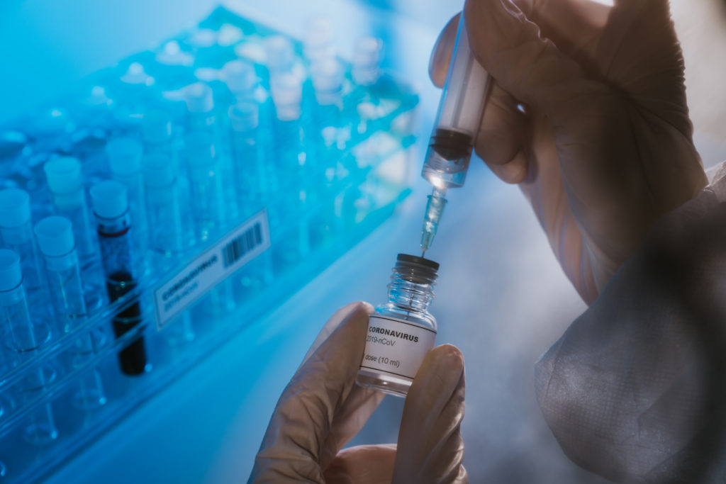Doctor preparing the coronavirus COVID-19 vaccine