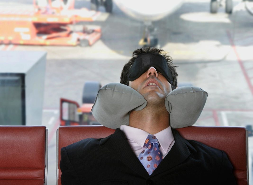 Man sleeping in an airport