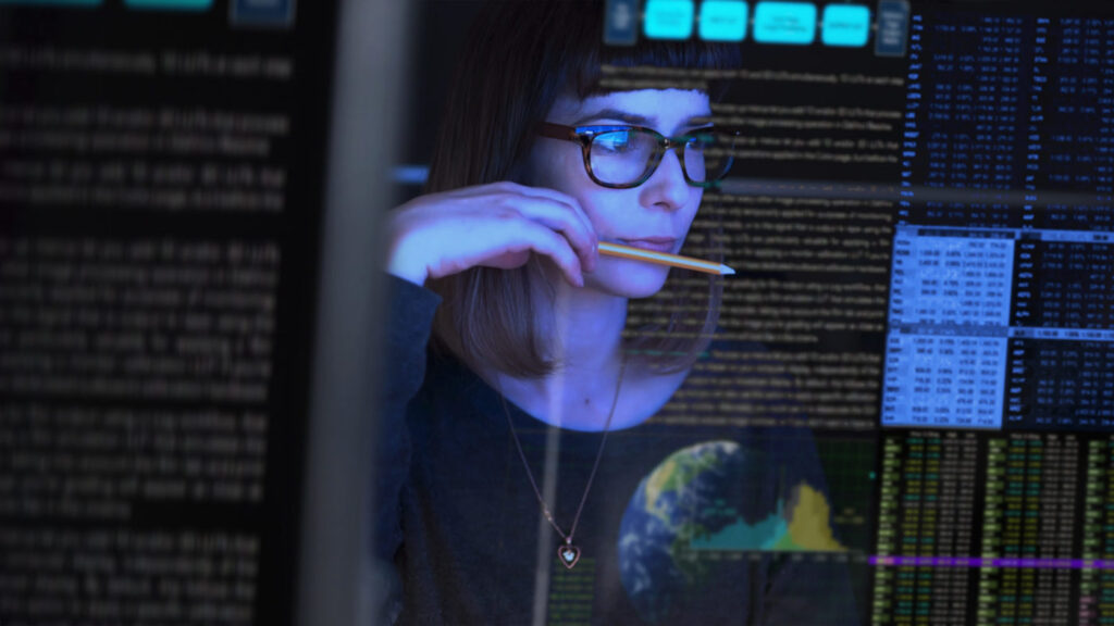 Close up watching data on screen