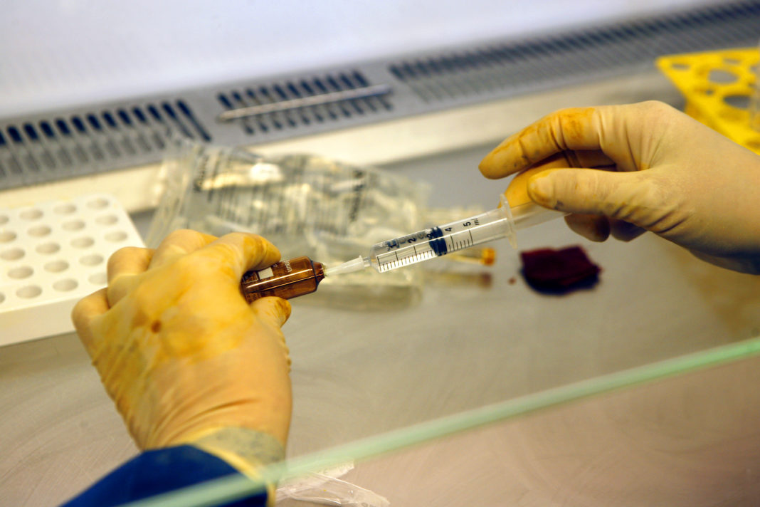Medical Technician Preparing Stem Cells