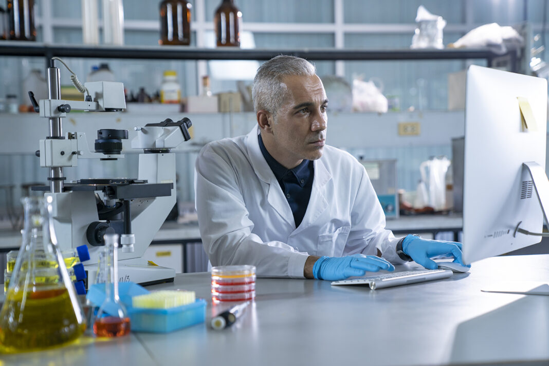 Scientists working in laboratories