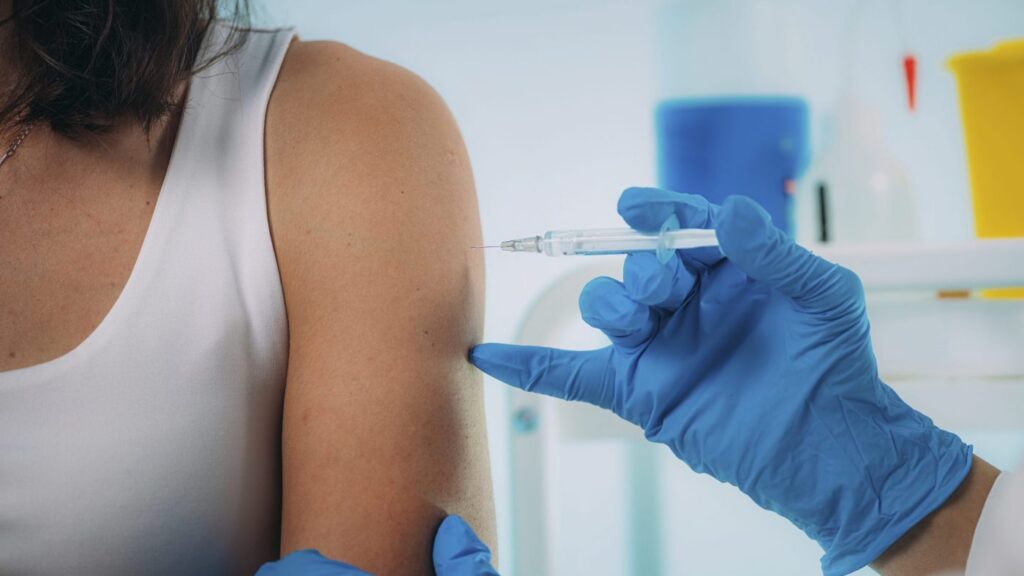 Woman being vaccinated