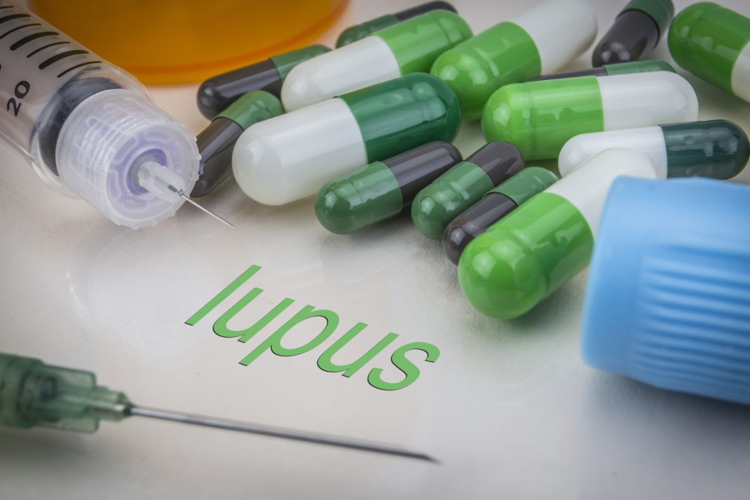 Lupus, medicines and syringes as concept of ordinary treatment health