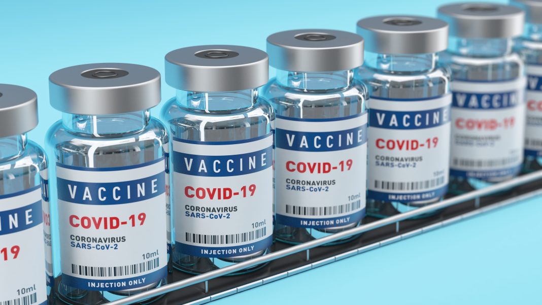 Production Line of Vaccine Covid-19 Corona Virus Concept vial bottles. Depth of field.