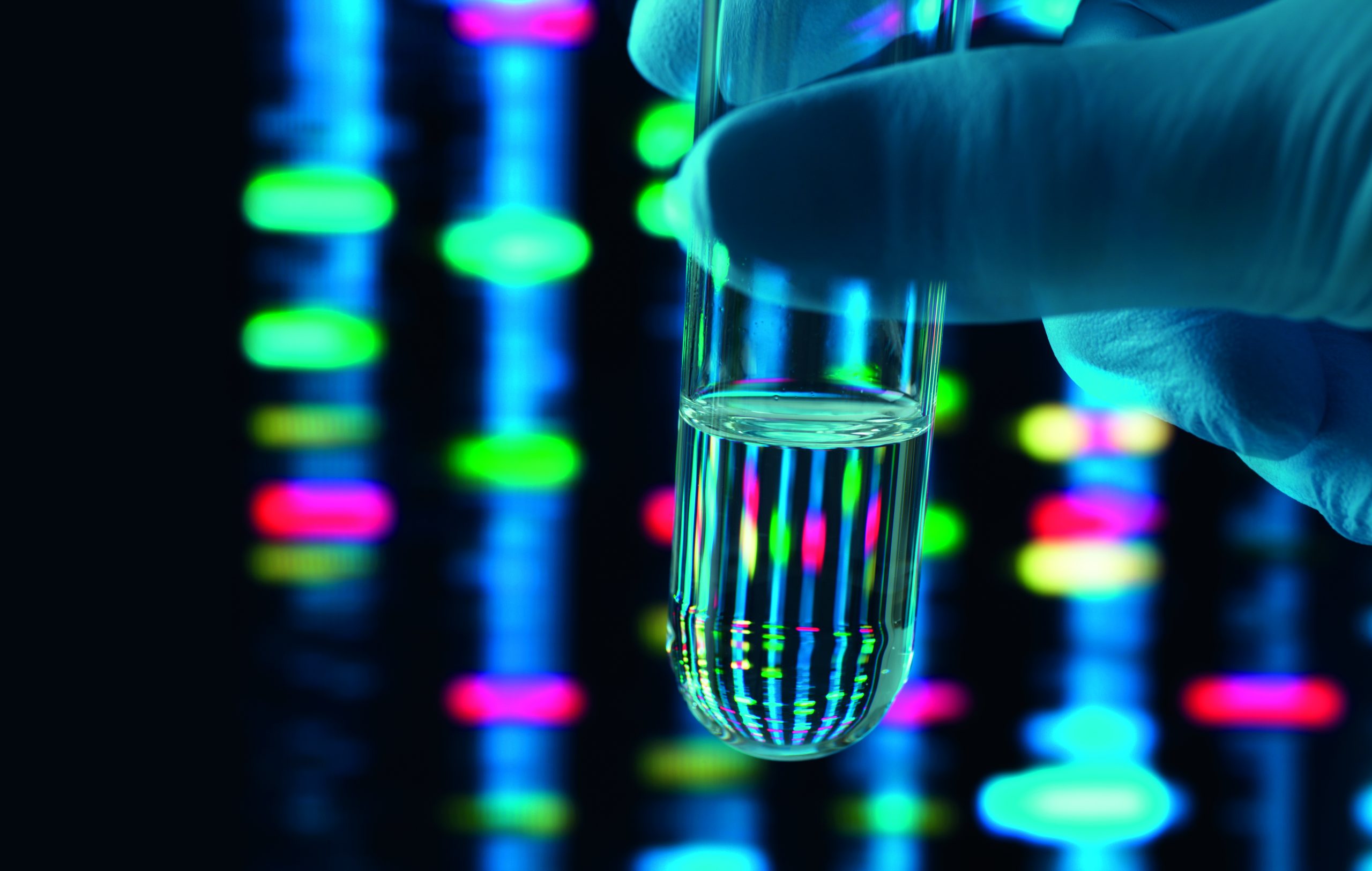 Genetic Research, DNA profile reflected in a test tube containing a sample