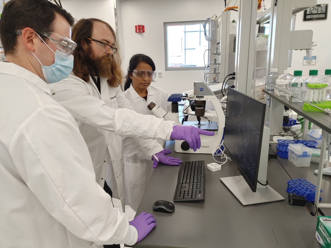 PassageBio scientists in lab
