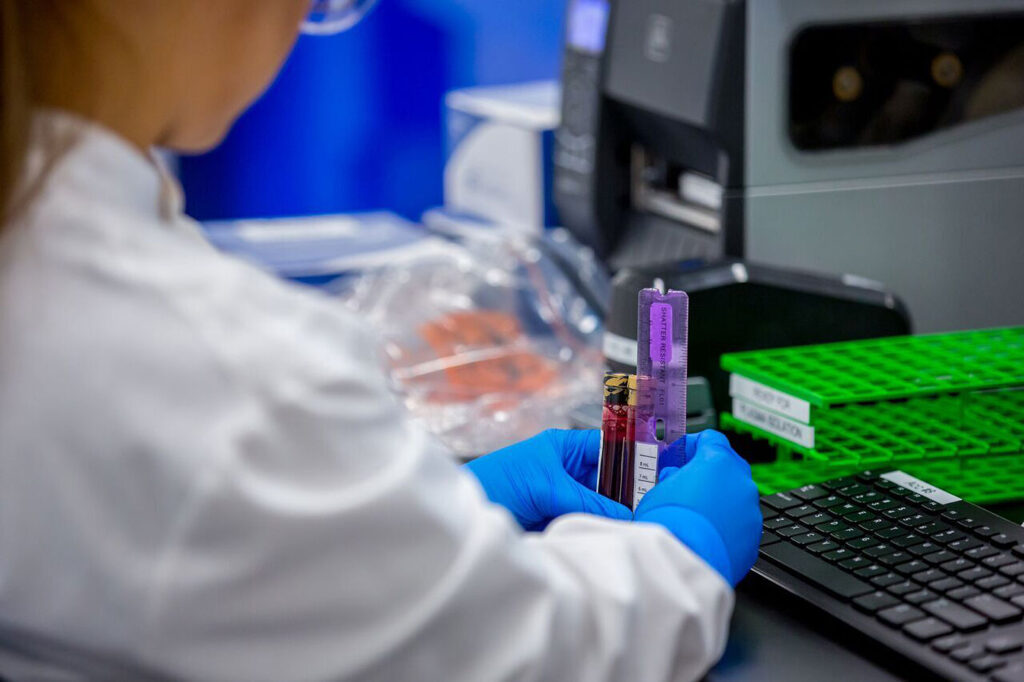 A blood sample is inspected at Guardant Health