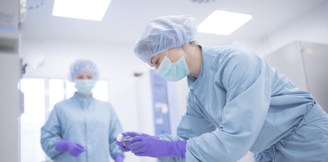 scientists in clean room