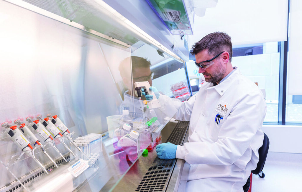 Adam Boutin, PhD, in Orum Therapeutics lab