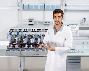 Eppendorf. operator prepares cell culture runs on DASBox bioreactor 