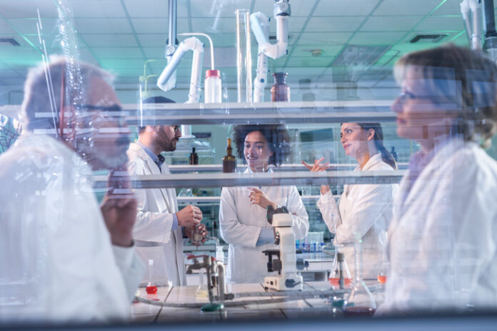 researchers in lab