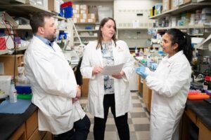 (L to R) Corresponding author Marcin Wlodarski, MD, PhD, and lab member Diantha Van De Vlekkert, MSc, both of the St. Jude Department of Hematology, and second author Sushree Sahoo, PhD, formerly of the St. Jude Department of Hematology. [St. Jude Children's Research Hospital]