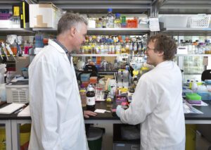 Justin Nodwell, PhD, in his lab with a colleague at University of Toronto.